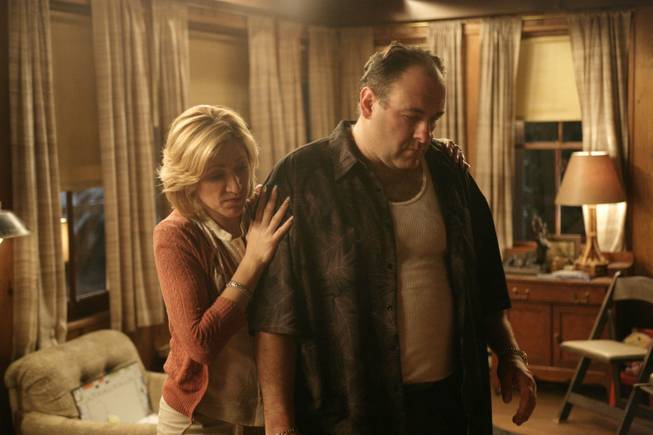 In this file photo, originally released by HBO in 2007, Edie Falco portrays Carmela Soprano and James Gandolfini is Tony Soprano in a scene from one of the last episodes of the hit HBO dramatic series "The Sopranos." Amazon is teaming up with HBO, the first such streaming arrangement agreed to by the cable network, in a deal that will make available to Amazon Prime members some classic TV like "The Sopranos" and "The Wire."