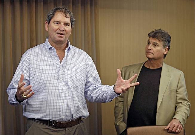 Former Cleveland Browns quarterback Bernie Kosar speaks at a news conference with Dr. Rick Sponaugle in Middleburg Heights, Ohio, on Jan. 10, 2013. Kosar believes he's been unfairly sacked as a TV broadcaster.