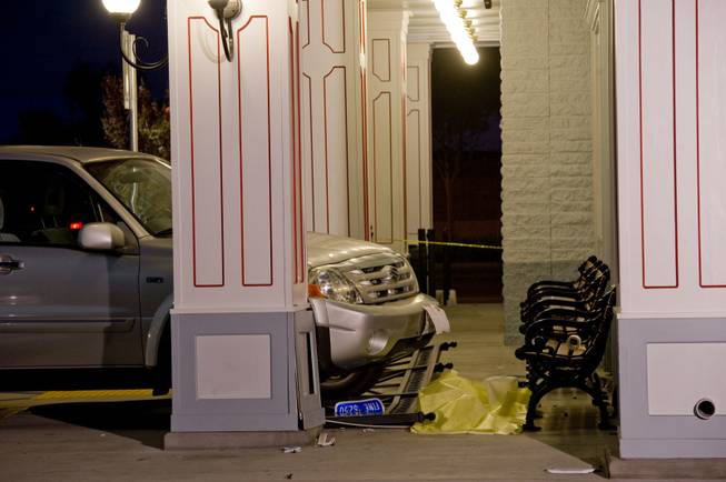 The SUV that was driven by a 70-year-old man still sits at the spot in front of Farrell's Ice Cream Parlour in Buena Park, Calif., where one woman was fatally injured and six others received moderate to minor injuries Friday, April 25, 2014.