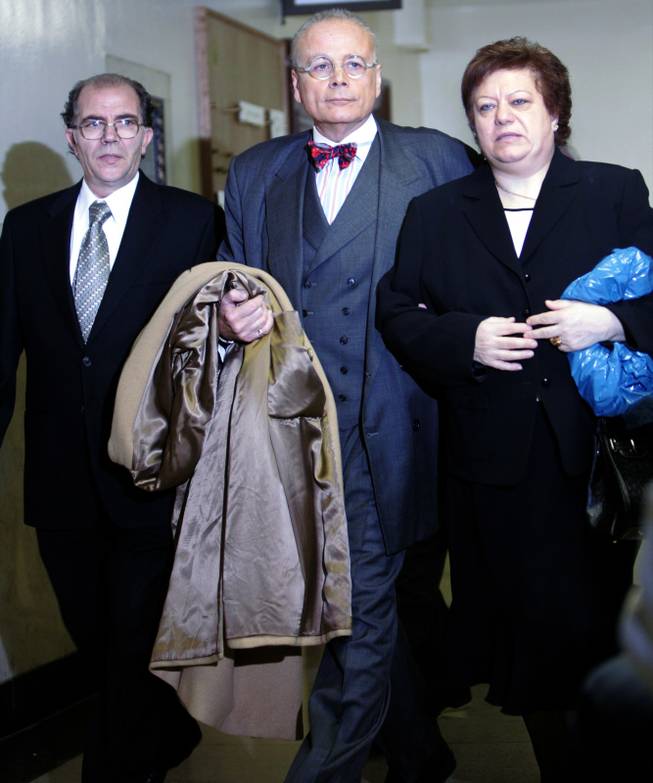 Lillo, left, and Dominique Brancato, right, arrive at Bronx criminal court with lawyer Mel Sachs on Jan. 9, 2006 in New York. Lillo Brancato Jr. and Steven Armento were arraigned on charges of second-degree murder, burglary and weapon possession in the death of off duty officer Daniel Enchautegui. Armento, the alleged triggerman, was additionally charged with two counts of first-degree murder.