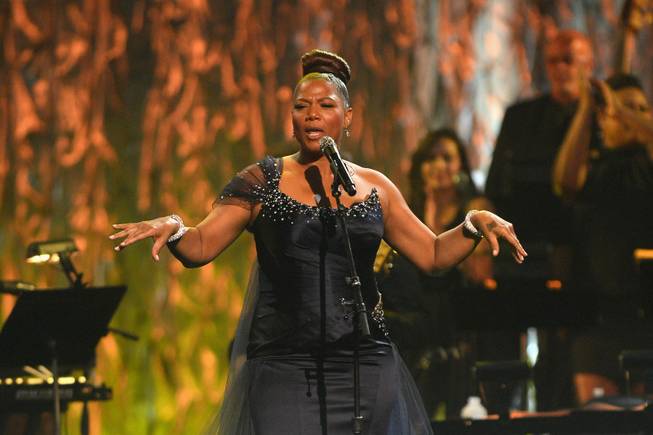 Recording artist/actress Queen Latifah performs onstage during the 18th annual Keep Memory Alive “Power of Love Gala” benefit for the Cleveland Clinic Lou Ruvo Center for Brain Health honoring Gloria Estefan and Emilio Estefan Jr. on Saturday, April 26, 2014, at MGM Grand Garden Arena.

