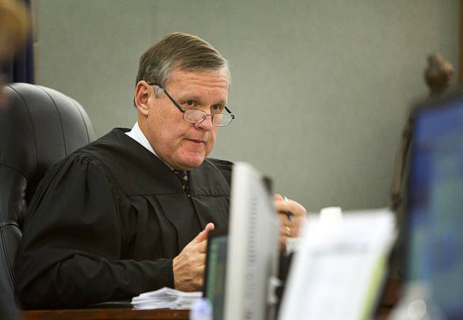 Judge David Barker presides over sentencing for Brittanie Merritt-Burwell at the Regional Justice Center Monday April 28, 2014. Merritt-Burwell  was sentenced to 96-240 months in prison on charges relating to a road rage incident on the Las Vegas Strip in December 2013.
