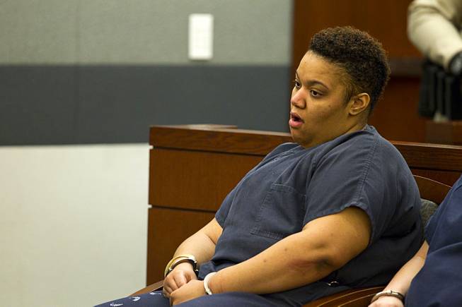 Brittanie Merritt-Burwell reacts after sentencing at the Regional Justice Center Monday April 28, 2014. Merritt-Burwell  was sentenced to 96-240 months in prison on charges relating to a road rage incident on the Las Vegas Strip in December 2013.