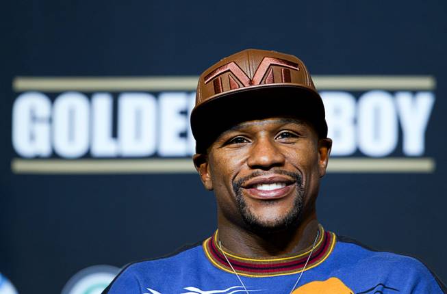 WBC welterweight champion Floyd Mayweather Jr. attends a news conference at the MGM Grand Wednesday, April 30, 2014. Mayweather will take on WBA welterweight champion Marcos Maidana of Argentina in a WBC/WBA unification fight at the MGM Grand Garden Arena on Saturday.