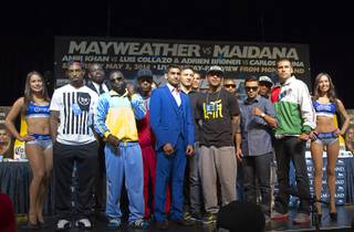 Undercard boxers pose during a news conference at the MGM Grand Thursday, May 1, 2014. The boxers will fight on the Mayweather vs. Maidana undercard at the MGM Grand Garden Arena on Saturday.