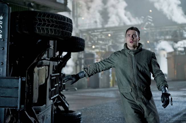 This photo released by Warner Bros. Pictures shows Aaron Taylor-Johnson as Ford Brody in the sci-fi action adventure "Godzilla." The film opens in theaters May 16, 2014.