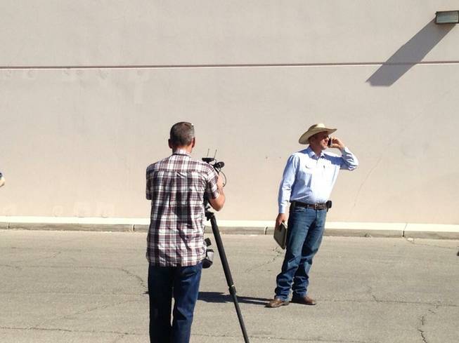 Ammon Bundy, Cliven Bundy's son, prepares a press conference in front of the Metro Police station on Friday, May 2.