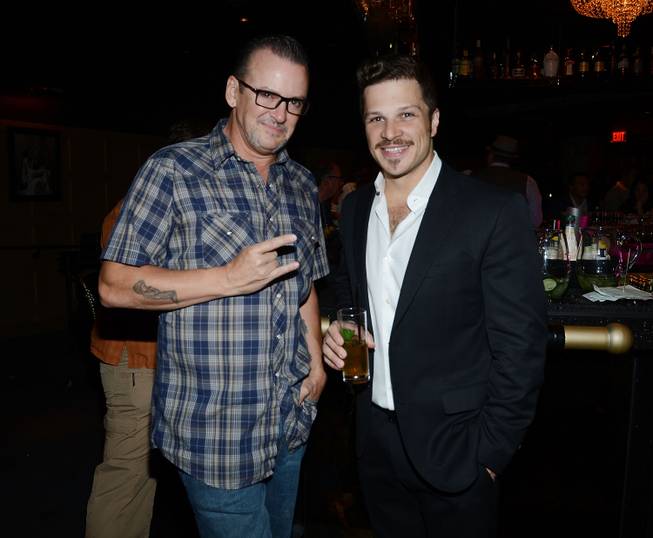 Troy Burgess and Mark Shunock attend the grand opening of 1923 Bourbon & Burlesque by Holly Madison at Mandalay Bay on Thursday, May 1, 2014, in Las Vegas.