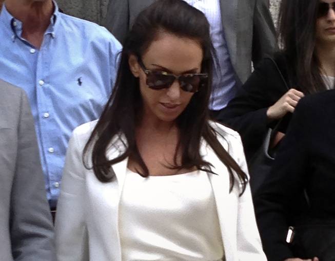 Molly Bloom leaves federal court after receiving probation for a guilty plea, Friday, May 2, 2014 in New York. 