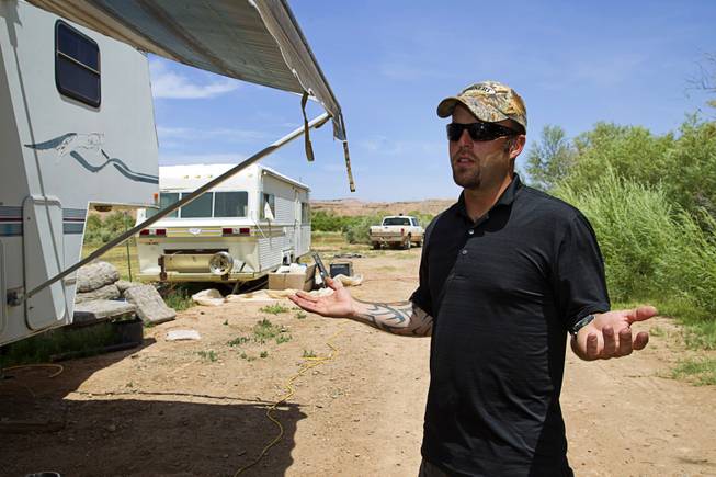 Ryan Payne, militia liaison, responds to a question during an interview at the Bundy Ranch near Bunkerville, Sunday, May 4, 2014.