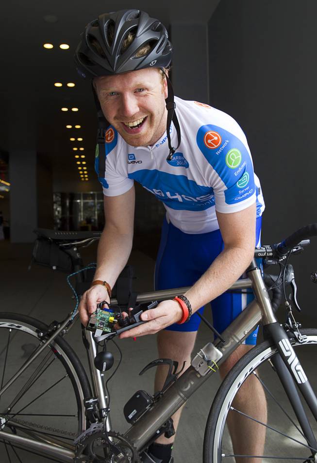 James Lyne, global head of security research at Sophos, displays his equipment before going "war biking" in Las Vegas Monday, May 5, 2014. His bicycle is equipped with a scanner and computer that can detect Wi-Fi networks.