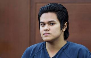 Jeremy Espiritu, 22, appears in court before his sentencing at the Regional Justice Center on Tuesday, May 6, 2014. Espiritu told police that he stabbed the family dog, Serenity, with a six-inch serrated knife because he 