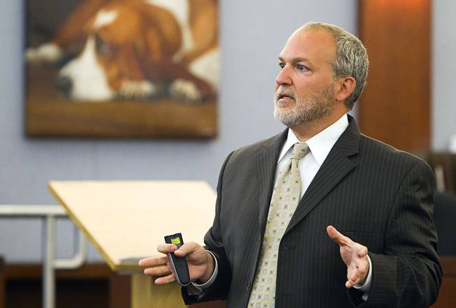 Prosecutor Marc DiGiacomo gives opening statements during the trial for Jason Omar Griffith at the Regional Justice Center Thursday, May 8, 2014. Griffith is accused of murdering Luxor "Fantasy" dancer Deborah Flores Narvaez in December 2010.