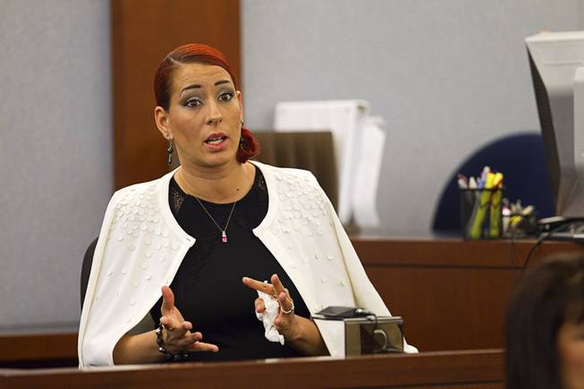 Celeste Flores Narvaez, sister of Deborah Flores Narvaez, testifies in the trial of Jason Omar Griffith at the Regional Justice Center Thursday, May 8, 2014. Griffith is accused of murdering Luxor "Fantasy" dancer Deborah Flores Narvaez in December 2010.
