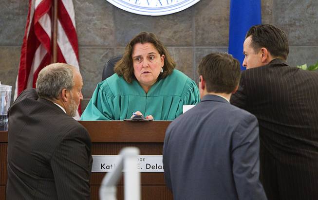 Judge Kathleen Delaney confers with attorneys during the trial for Jason Omar Griffith at the Regional Justice Center Thursday, May 8, 2014. Griffith is accused of murdering Luxor "Fantasy" dancer Deborah Flores Narvaez in December 2010.