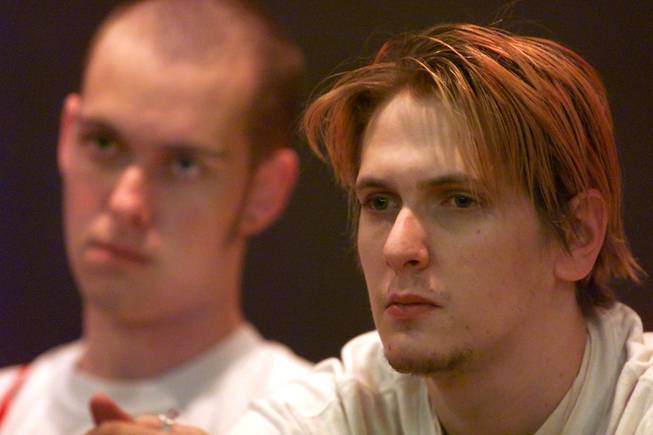 Anti-Racist Action (ARA) member Brandon Sledge, right, listens to a hearing before the start of alleged skinhead gang member John Edward Butler's murder trial Thursday, Dec. 7, 2000 at the Clark County Courthouse. In background left is another ARA member who asked to remain unidentified. Butler is on trial for the murder of anti-racist skinheads Daniel Shersty and Lin Newborn in July 1998.