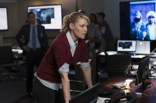 In this photo provided by NBC, Katherine Heigl portrays CIA agent Charleston Tucker in NBC's new series, "State of Affairs."