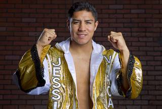 Las Vegan Jessie Vargas poses before a workout at Top Rank Gym Monday, May 12, 2014. Vargas defeated Khabib Allakhverdiev of Russia at the MGM Grand Garden Arena on April 12 to take the WBA super lightweight (140 lbs.) title. Allakhverdiev was previously undefeated.