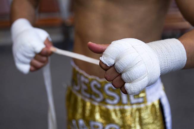 Las Vegan Jessie Vargas wraps his hands before a workout at Top Rank Gym Monday, May 12, 2014. Vargas defeated Khabib Allakhverdiev of Russia at the MGM Grand Garden Arena on April 12 to take the WBA super lightweight (140 lbs.) title. Allakhverdiev was previously undefeated.