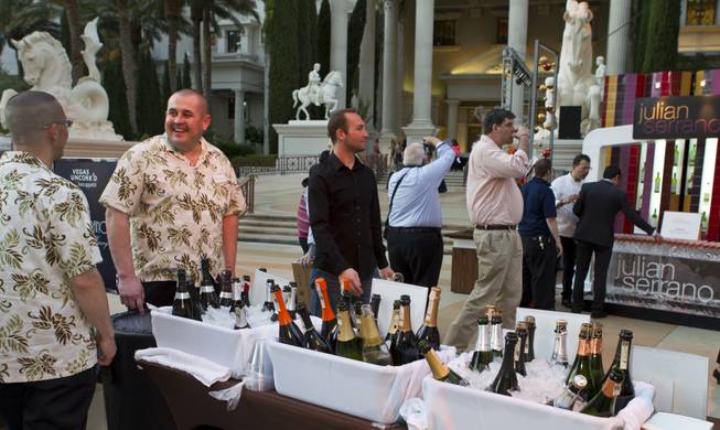 Plenty of wine is ready to be served at the Grand Tasting during the Uncork'd annual event at Caesars Garden of the Gods Pool on Friday, May 9, 2014.