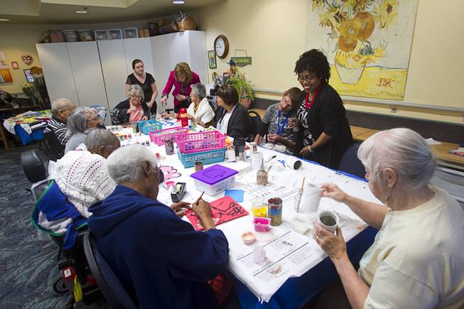 Seniors work on art projects at the Nevada Senior Services Adult Day Care Center of Las Vegas, 901 N. Jones Blvd., Wednesday, May 14, 2014.