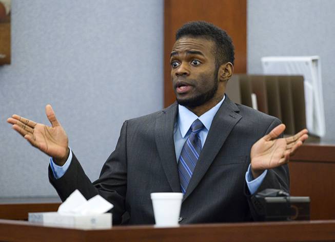 Defendant Jason Omar Griffith speaks to the jury as he testifies in his own defense during his trial at the Regional Justice Center Wednesday, May 14, 2014. Griffith is accused of murdering Luxor "Fantasy" dancer Deborah Flores Narvaez in December 2010.