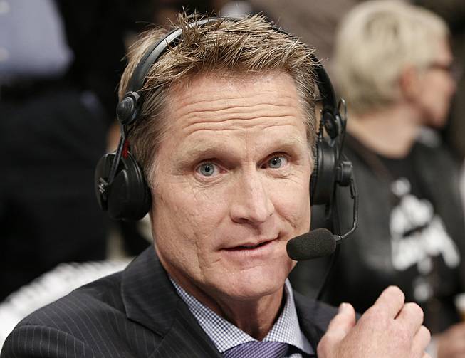 TNT commentator and former Chicago Bulls and San Antonio Spurs guard Steve Kerr broadcasts courtside for Game 4 of an NBA basketball first-round playoff series between the Toronto Raptors and the Brooklyn Nets, Sunday, April 27, 2014, in New York. 