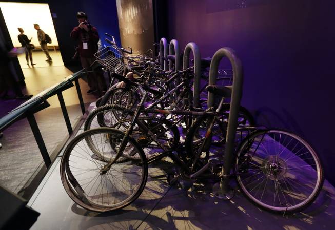 A salvaged bicycle rack, that was located on the northern edge of the World Trade Center site, is displayed at the National Sept. 11 Memorial Museum, Wednesday, May 14, 2014, in New York. The museum is a monument to how the Sept. 11 terror attacks shaped history, from its heart-wrenching artifacts to the underground space that houses them amid the remnants of the fallen twin towers' foundations. It also reflects the complexity of crafting a public understanding of the terrorist attacks and reconceiving ground zero.  (AP Photo)