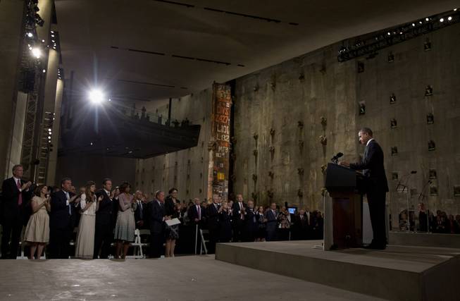 President Barack Obama speaks at the National September 11 Memorial Museum, Thursday, May 15, 2014, in New York. Speaking at the dedication, the president said, no act of terror can match the strength and character of the United States.   (AP Photo/Carolyn Kaster)
