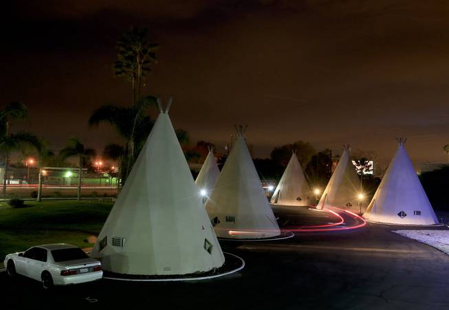 The Wigwam Motel still attracts tourists to its teepee-shaped rooms along "America's Highway," Route 66 in San Bernardino, Calif. As the number of tourists attracted by the historic roadway dwindle, merchants along the route must find new ways to attract visitors.