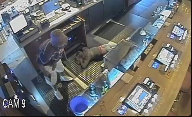Henderson Police released this surveillance photo from an armed robbery May 4 at a Wildfire Casino in Henderson. Police are seeking clues to the identity of the man, who forced an employee to the floor at gunpoint while robbing the casino.