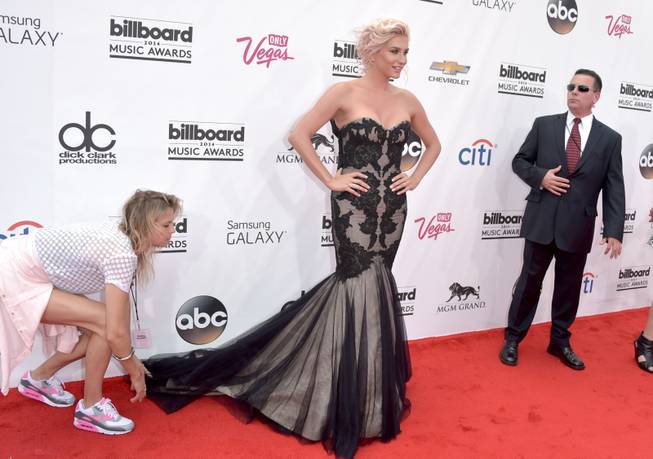 Ke$ha arrives at the 2014 Billboard Music Awards at MGM Grand Garden Arena on Sunday, May 18, 2014, in Las Vegas.