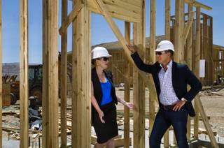 Daniel Grimm and Alison Burk talk about their construction site at Somerset Hills, a 20-acre 360-unit complex in southwest Las Vegas on Friday, May 9, 2014.  Grimm is president and CEO of Development Corporation and Burk development director with the Fore Property Company.