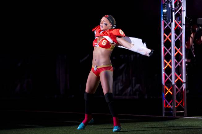 Markie Henderson, of the Las Vegas SIN, makes her enterance on the field before going against Green Bay Chill, Thursday May 15, 2014. The SIN beat Green Bay 34 to 24 at Thomas & Mack Center, their first win of the Legends Football League season.