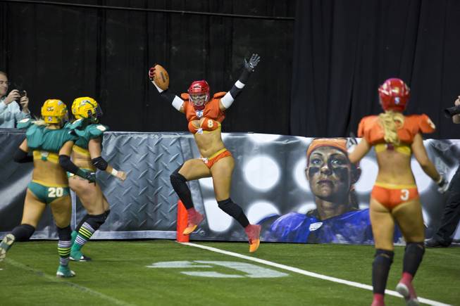 Danika Brace, of the Las Vegas SIN, celebrates after scoreing a touchdown against Green Bay Chill, Thursday May 15, 2014. The SIN beat Green Bay 34 to 24 at Thomas & Mack Center, their first win of the Legends Football League season.