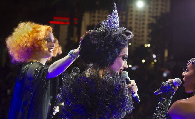 Cast member Bianca Del Rio has her crown adjusted by season five winner Jinkx Monsoon after being declared the winner of season six of 'RuPaul's Drag Race' during a viewing party for the show's finale at the New Tropicana  on Monday, May 19, 2014.