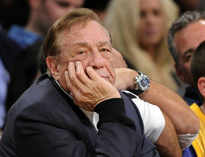 In this Feb. 25, 2011, file photo, Los Angeles Clippers owner Donald Sterling watches the first half of their NBA game against the Los Angeles Lakers in Los Angeles.