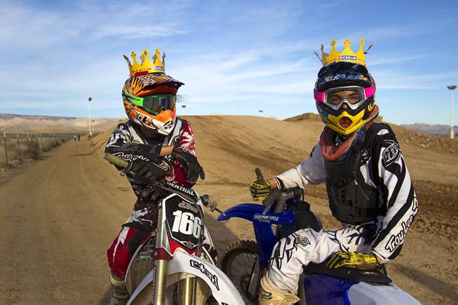 Robert Slattery, 25, of Henderson and Nick Rodriguez of Las Vegas pose at the Sandy Valley MX motocross course in Sandy Valley Thursday, May 15, 2014. The pair are wearing crowns as they went to Burger King before coming to the track, the said.