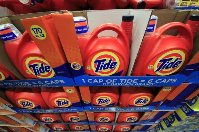 In this Tuesday, Jan. 21, 2014, file photo, Tide detergent is displayed at a Costco store in Robinson Township, Pa. Proctor & Gamble reports quarterly earnings on Friday, Jan. 24, 2014.