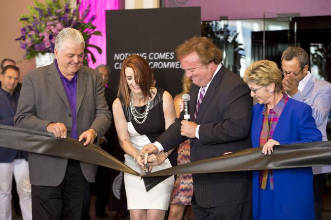 Clark Counry Commissioner Steve Sisolak, Karie Hall, VP & General Manager of The Cromwell, Gary Loveman, ceo and president of Caesars Entertainment, and Clark Counry Commissioner Chris Giunchigliani cut the ribbon during the opening ceremony of The Cromwell, Wednesday May 21, 2014. The Cromwell is the first stand-alone boutique hotel located on the Las Vegas Strip.