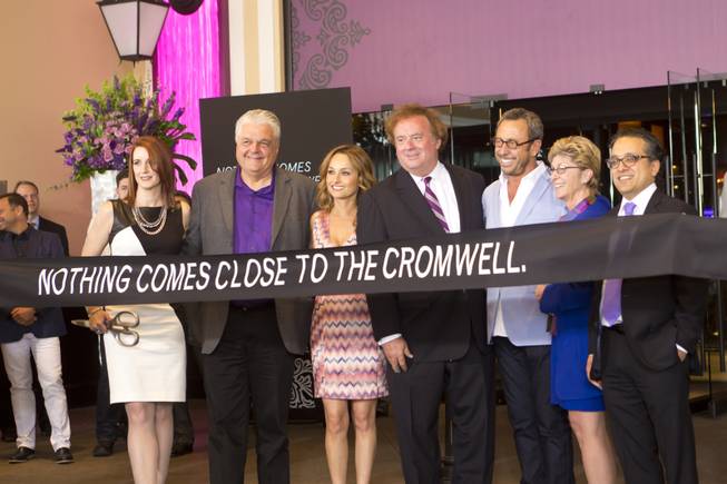 From left: Karie Hall, VP & General Manager of The Cromwell, Clark Counry Commissioner Steve Sisolak, Giada De Laurentiis, Gary Loveman, ceo and president of Caesars Entertainment, Victor Drai, Clark Counry Commissioner Chris Giunchigliani, and Tariq Shakaut, executive VP of Caesars Entertainment, stand for photos during the ribbon-cutting ceremony of The Cromwell, Wednesday May 21, 2014. The Cromwell is the first stand-alone boutique hotel located on the Las Vegas Strip.