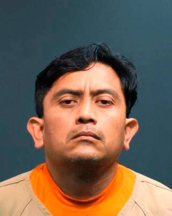 In this Tuesday, May 20, 2014, photo released by the Santa Ana Police Department, shows suspect Isidro Garcia, age 41 of Bell Gardens, Calif. who was arrested in Santa Ana, Calif. Garcia allegedly kidnapped a 15-year-old girl in Santa Ana in 2004 then repeatedly physically and sexually assaulted her over the course of 10 years. He was booked for kidnap for rape, and lewd acts with a minor and false Imprisonment.
