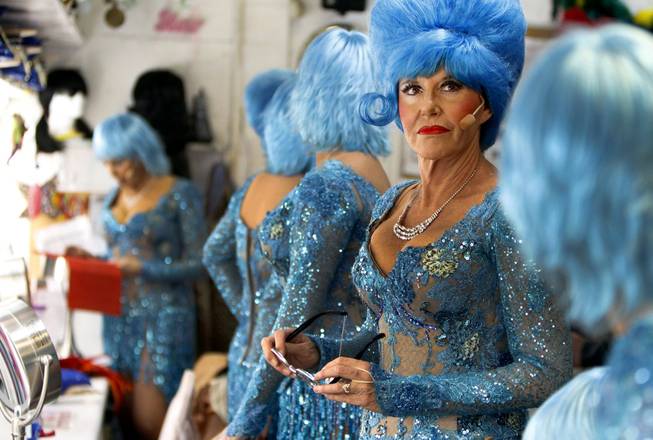Karrie France, 57, waits in the dressing room for the start of "The Fabulous Palm Springs Follies" in Palm Springs, Calif., on March 27, 2014.