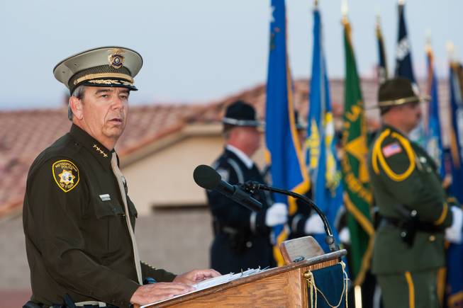 Sheriff Douglas Gillespie honors the memory of fallen officers while speaking during the Southern Nevada Law Enforcement Memorial ceremony at Police Memorial Park in Las Vegas Thursday, May 22, 2014.