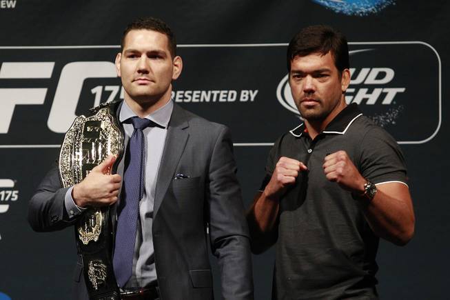 Chris Weidman and Lyoto Machida attend a news conference Friday, May 23, 2014, at MGM Grand Garden Arena to promote UFC 175. UFC 175 is July 5 at Mandalay Bay Events Center.