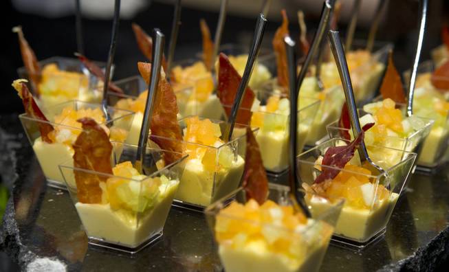 Culinary Arts Catering serves a smoked prosciutto vanilla bean ice cream Napolean during the Epicurean Affair presented by the Nevada Restaurant Association at the Palazzo on Thursday, May 22, 2014.