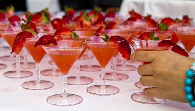 Canyon Ranch Grill serves a strawberry cadillac margarita during the Epicurean Affair presented by the Nevada Restaurant Association at the Palazzo on Thursday, May 22, 2014.