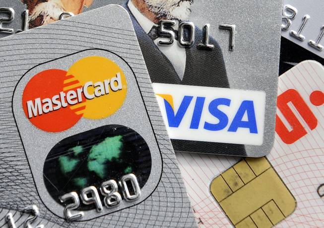 This Nov. 18, 2009, file photo shows credit and bank cards with electronic chips in Gelsenkirchen, Germany.