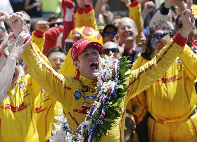 Ryan Hunter-Reay celebrates winning the 98th running of the Indianapolis 500 IndyCar auto race at the Indianapolis Motor Speedway in Indianapolis on Sunday, May 25, 2014.