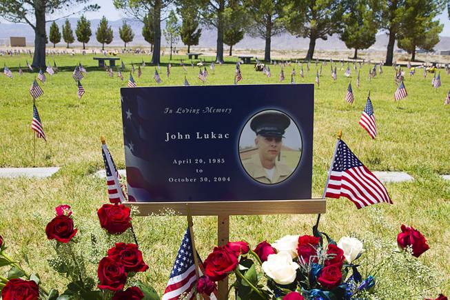 The grave site of Marine Pfc. John Lukac, a Durango High School graduate, is shown at the Southern Nevada Veterans Memorial Cemetery in Boulder City Monday, May 26, 2014. Lukac was killed while serving in Iraq during Operation Iraqi Freedom in October 2004.